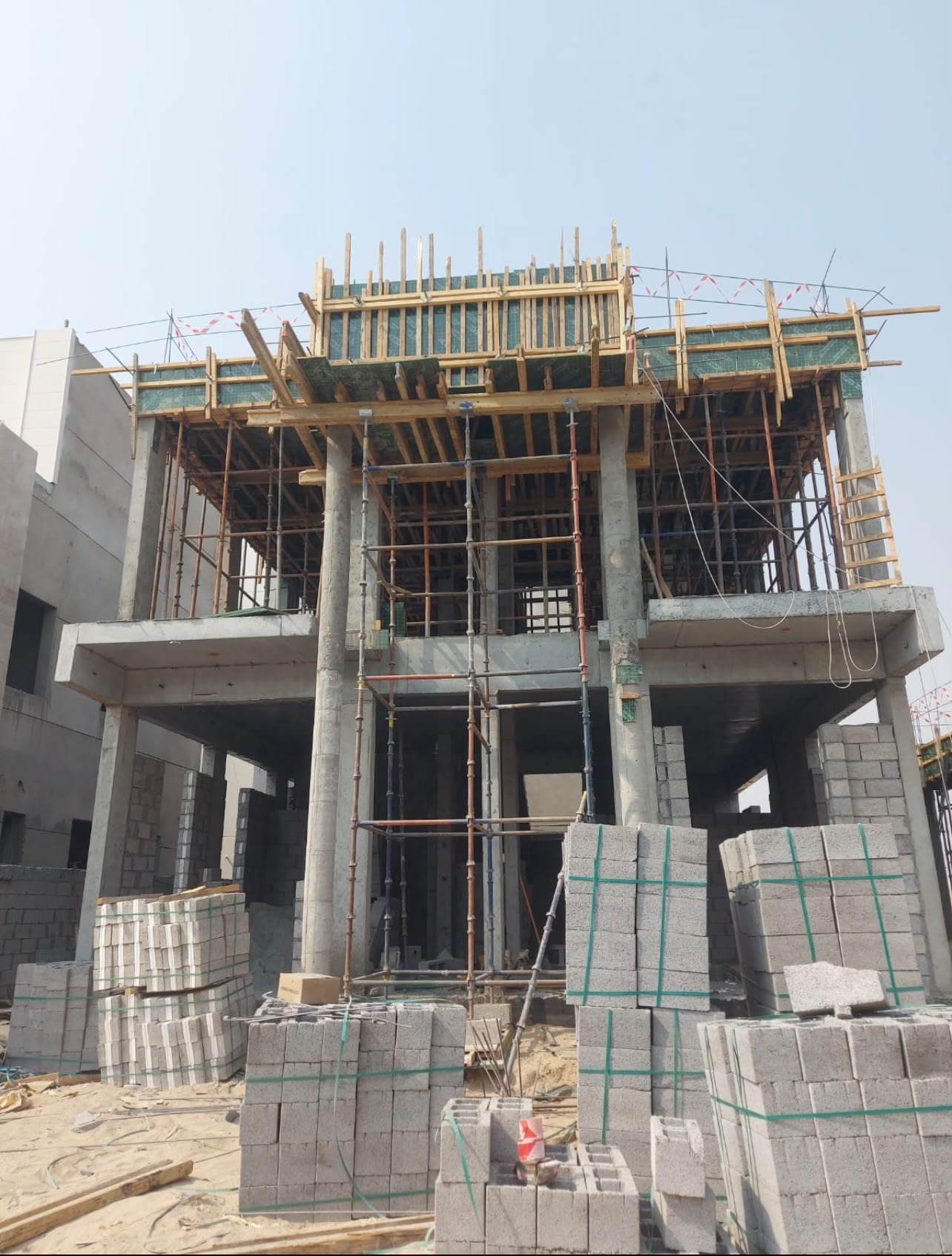 Residential reinforced-concrete frame and upper-level formwork